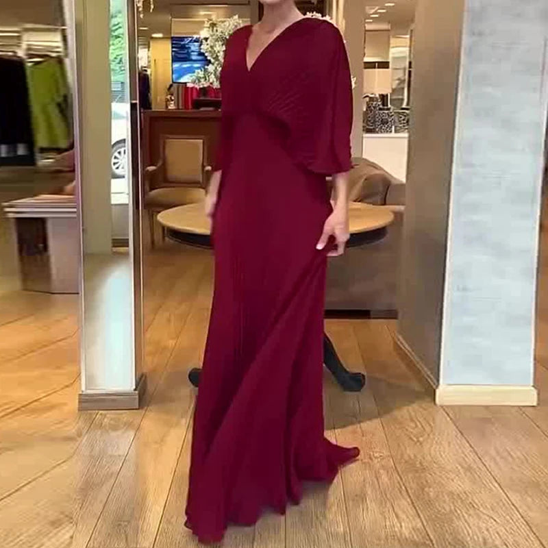 Vestido Longo Feminino Plissado com Decote Profundo – Elegante e Sofisticado