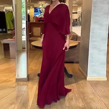 Vestido Longo Feminino Plissado com Decote Profundo – Elegante e Sofisticado