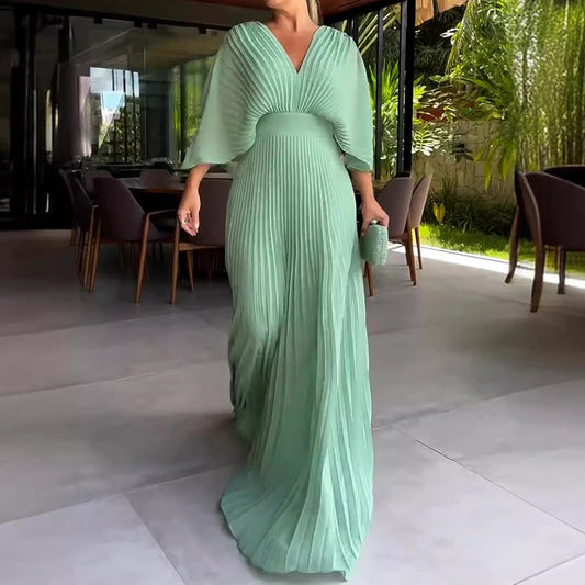 Vestido Longo Feminino Plissado com Decote Profundo – Elegante e Sofisticado